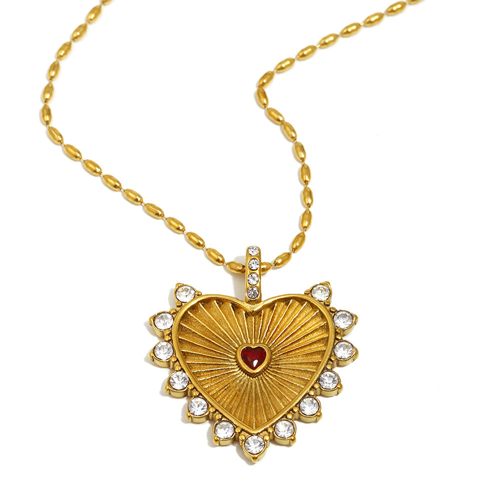 Stainless steel plated 18K gold carved heart-shaped necklace
